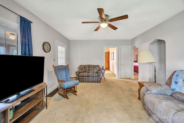 677 Ridgewood Ave, Hamilton, OH 45013 - carpeted living area with arched walkways and ceiling fan