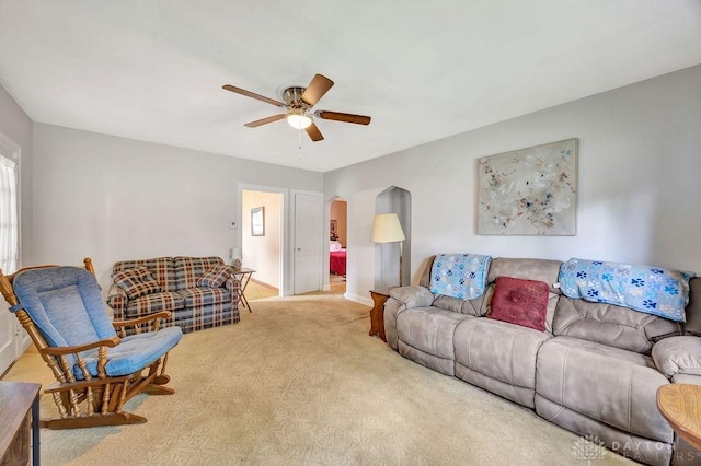 677 Ridgewood Ave, Hamilton, OH 45013 - carpeted living area featuring arched walkways and a ceiling fan