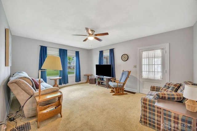 677 Ridgewood Ave, Hamilton, OH 45013 - carpeted living area with a ceiling fan and baseboards