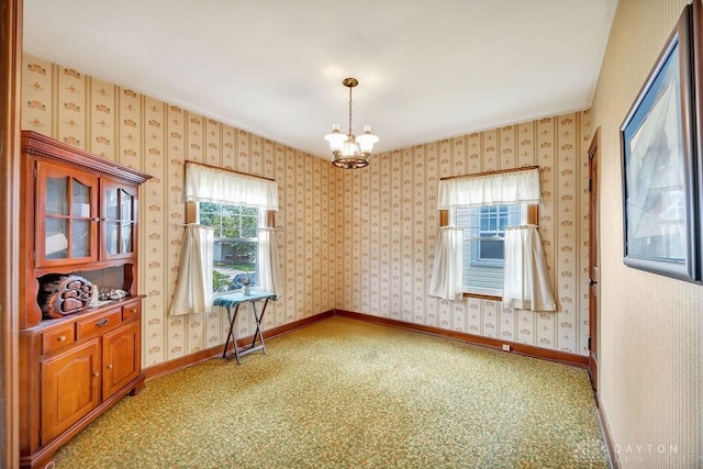 677 Ridgewood Ave, Hamilton, OH 45013 - unfurnished room with a chandelier and baseboards