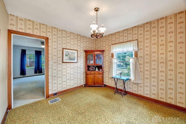 677 Ridgewood Ave, Hamilton, OH 45013 - spare room with a chandelier and baseboards