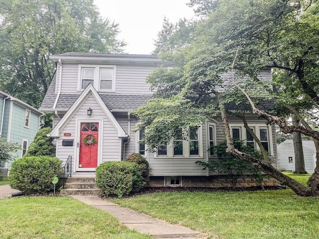1110 E Main St, Troy, OH 45373 - view of front of home featuring a front yard, entry steps, and roof with shingles