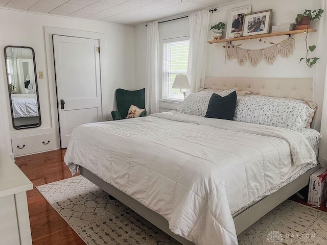 1110 E Main St, Troy, OH 45373 - bedroom with wood finished floors