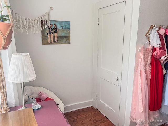 1110 E Main St, Troy, OH 45373 - bedroom featuring wood finished floors and baseboards