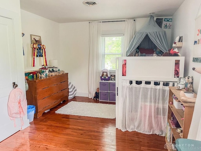 1110 E Main St, Troy, OH 45373 - bedroom featuring wood finished floors