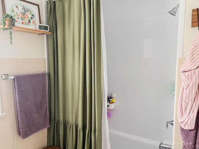 1110 E Main St, Troy, OH 45373 - bathroom featuring shower / bathtub combination with curtain