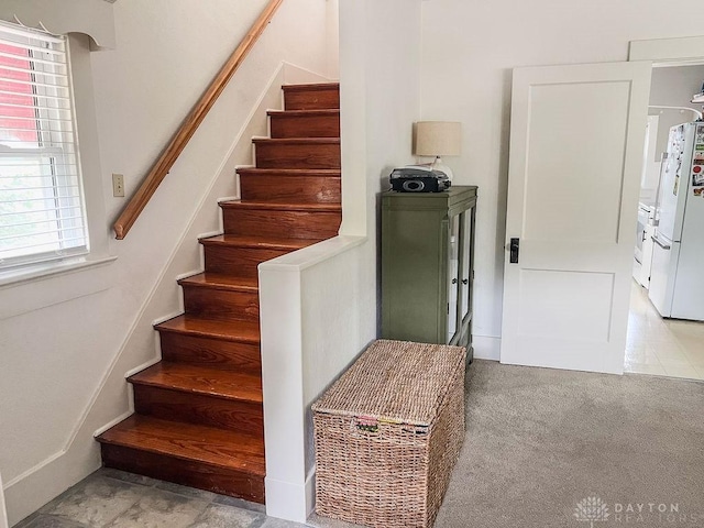 1110 E Main St, Troy, OH 45373 - stairway with carpet flooring