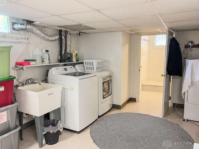 1110 E Main St, Troy, OH 45373 - laundry room with washing machine and clothes dryer and healthy amount of natural light