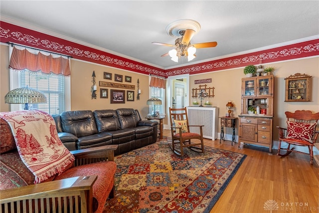 288 N King St, Xenia, OH 45385 - living room featuring ornamental molding, ceiling fan, and wood finished floors