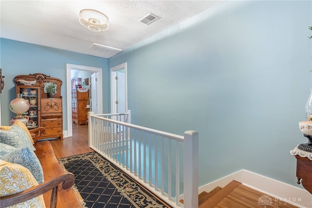 288 N King St, Xenia, OH 45385 - hall with an upstairs landing and wood finished floors