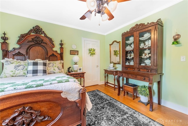 288 N King St, Xenia, OH 45385 - bedroom with wood finished floors, ornamental molding, and ceiling fan
