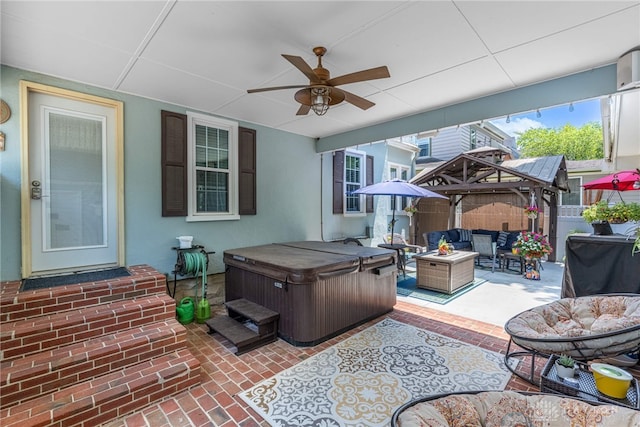 288 N King St, Xenia, OH 45385 - view of patio with a hot tub, an outdoor hangout area, and a ceiling fan