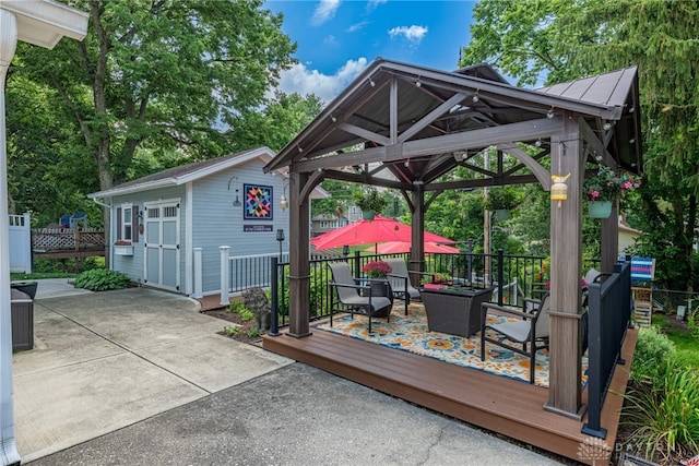 288 N King St, Xenia, OH 45385 - view of patio featuring a gazebo, a deck, and an outdoor structure