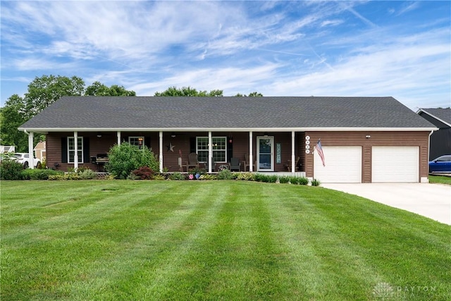 4095 N State Route 42, Waynesville, OH 45068 - ranch-style home with a porch, a garage, a front yard, and driveway
