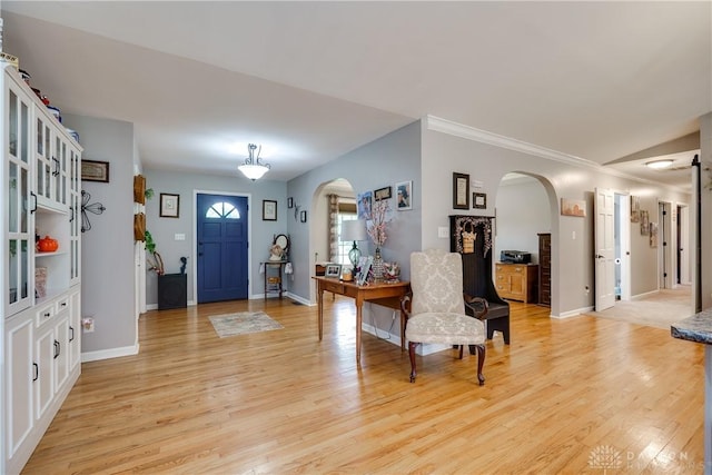 4095 N State Route 42, Waynesville, OH 45068 - entryway with arched walkways, light wood-type flooring, and ornamental molding