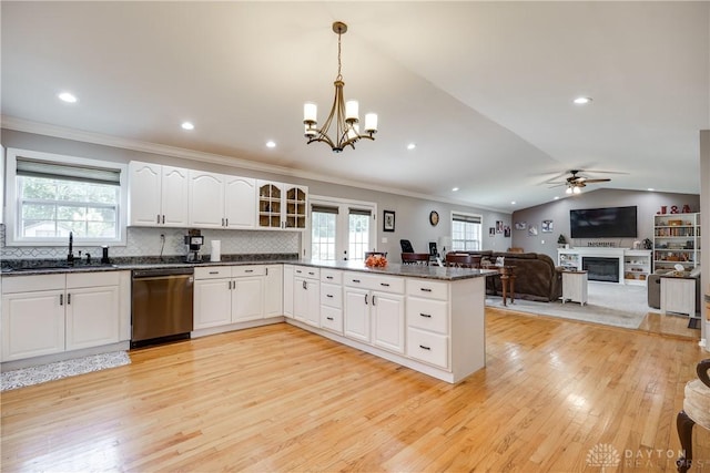 4095 N State Route 42, Waynesville, OH 45068 - kitchen featuring dishwasher, a ceiling fan, healthy amount of natural light, ornamental molding, and light wood-style floors