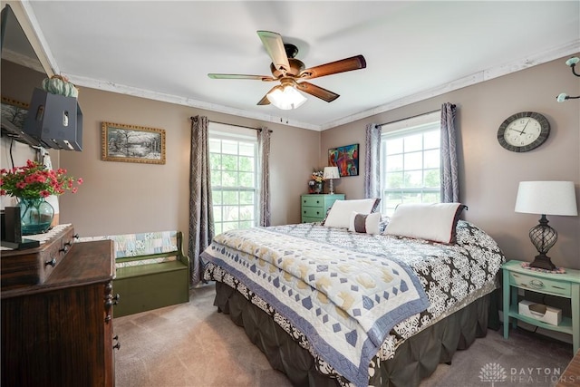 4095 N State Route 42, Waynesville, OH 45068 - bedroom with multiple windows, light colored carpet, ornamental molding, and a ceiling fan