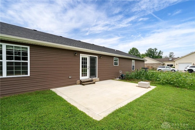 4095 N State Route 42, Waynesville, OH 45068 - rear view of house featuring a lawn, a patio area, and entry steps