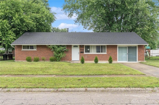 2227 Los Arrow Dr, Dayton, OH 45439 - single story home with a front yard and brick siding