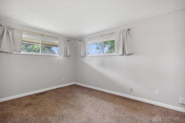 2227 Los Arrow Dr, Dayton, OH 45439 - unfurnished room with plenty of natural light and carpet flooring