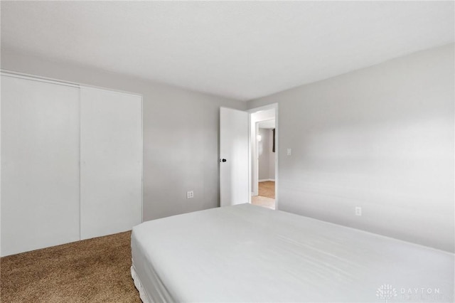 2227 Los Arrow Dr, Dayton, OH 45439 - bedroom with carpet and a closet