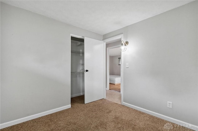 2227 Los Arrow Dr, Dayton, OH 45439 - unfurnished bedroom featuring carpet and a closet
