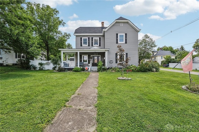 213 N Broadway St, Blanchester, OH 45107 - view of front of house with a porch and a chimney