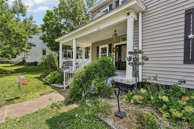 213 N Broadway St, Blanchester, OH 45107 - property entrance featuring a yard and a porch