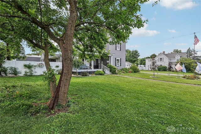 213 N Broadway St, Blanchester, OH 45107 - obstructed view of property featuring a porch