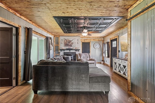 213 N Broadway St, Blanchester, OH 45107 - living room with ceiling fan, wooden ceiling, a fireplace, plenty of natural light, and wooden walls