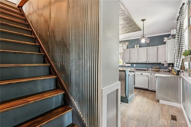 213 N Broadway St, Blanchester, OH 45107 - staircase featuring wood finished floors