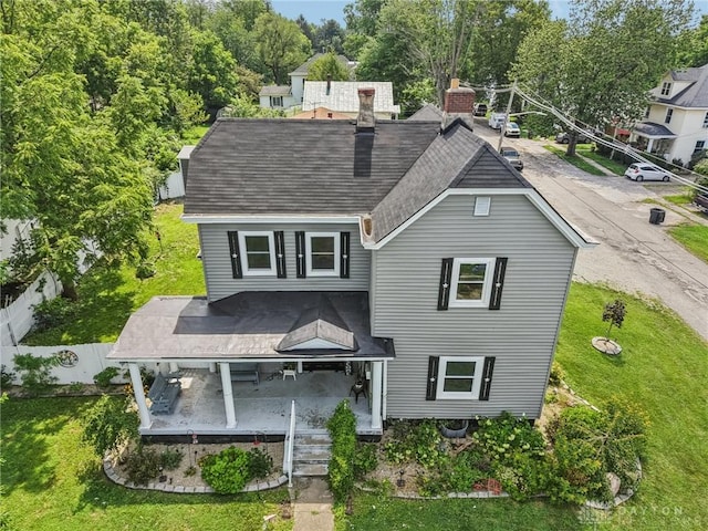 213 N Broadway St, Blanchester, OH 45107 - rear view of property with roof with shingles and a chimney