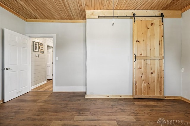 213 N Broadway St, Blanchester, OH 45107 - unfurnished bedroom with wood ceiling, wood finished floors, and a barn door