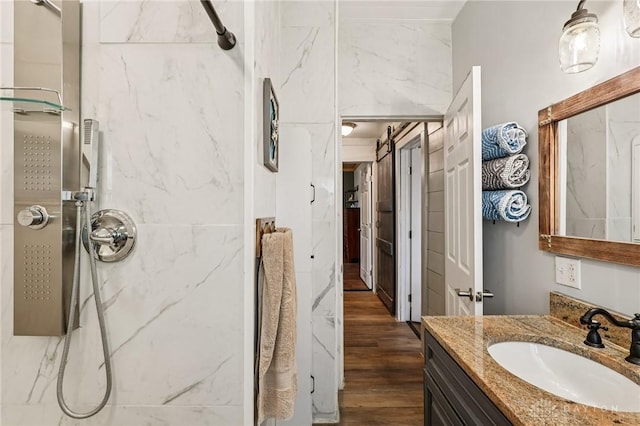 213 N Broadway St, Blanchester, OH 45107 - full bath with vanity, a marble finish shower, and wood finished floors