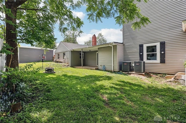 213 N Broadway St, Blanchester, OH 45107 - view of grassy yard with an outdoor fire pit