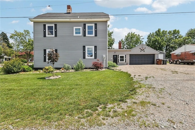 213 N Broadway St, Blanchester, OH 45107 - view of front of home featuring a chimney and a front yard