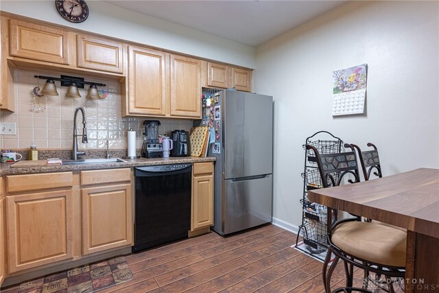 3301 Witherward Trl, Miami Twp, OH 45449 - kitchen with dishwasher, freestanding refrigerator, dark wood finished floors, and light brown cabinets