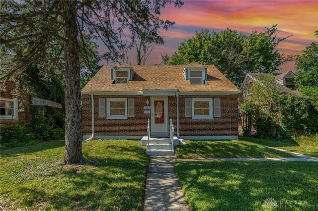 1337 Shepherd Ln, Hamilton, OH 45215 - view of front of home with brick siding and a yard