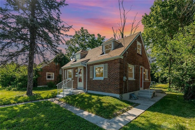 1337 Shepherd Ln, Hamilton, OH 45215 - view of front of house with brick siding and a lawn