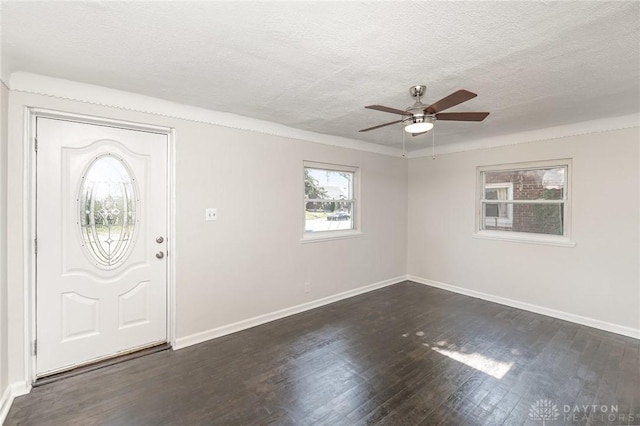 1337 Shepherd Ln, Hamilton, OH 45215 - foyer entrance with a textured ceiling, dark wood-style flooring, and a ceiling fan