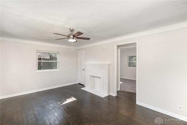 1337 Shepherd Ln, Hamilton, OH 45215 - unfurnished living room with ceiling fan, wood finished floors, and a textured ceiling