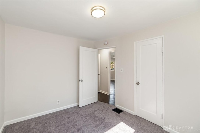 1337 Shepherd Ln, Hamilton, OH 45215 - unfurnished bedroom featuring carpet flooring and baseboards