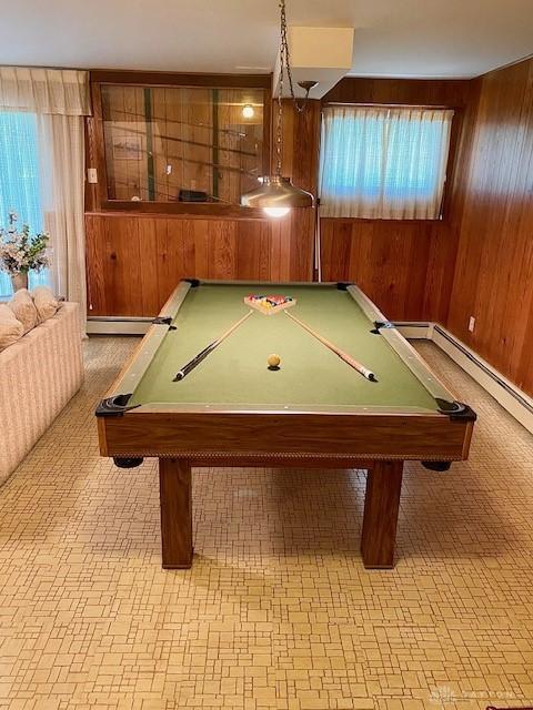 9476 Sheehan Rd, Dayton, OH 45458 - game room featuring wood walls, billiards table, and baseboard heating