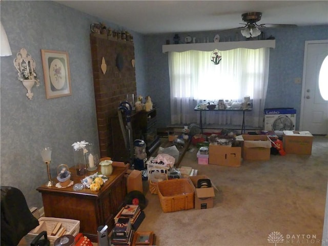 3784 Cheyenne Trl, New Jasper Twp, OH 45335 - carpeted living room featuring wallpapered walls and ceiling fan