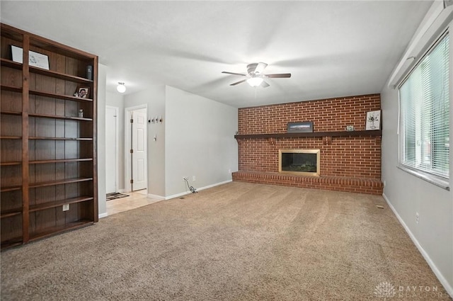 1360 Fenway Ct, Centerville, OH 45458 - unfurnished living room featuring ceiling fan, carpet, and a fireplace