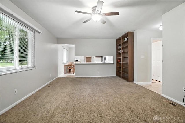 1360 Fenway Ct, Centerville, OH 45458 - unfurnished living room with carpet and a ceiling fan