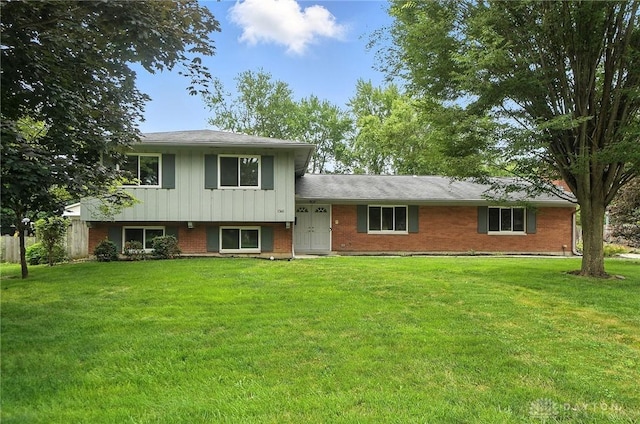 1360 Fenway Ct, Centerville, OH 45458 - tri-level home featuring a front yard, brick siding, and board and batten siding