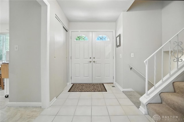 1360 Fenway Ct, Centerville, OH 45458 - foyer featuring stairway, healthy amount of natural light, and tile patterned flooring