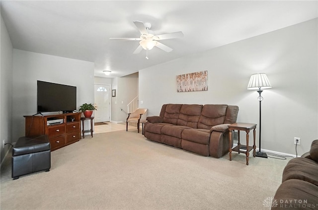 1360 Fenway Ct, Centerville, OH 45458 - carpeted living room with ceiling fan and stairway