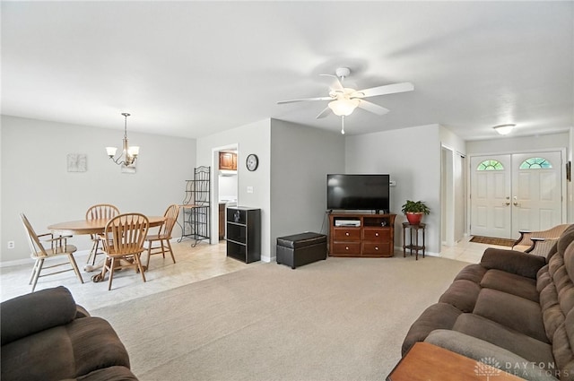 1360 Fenway Ct, Centerville, OH 45458 - living room featuring a chandelier, a ceiling fan, and light colored carpet